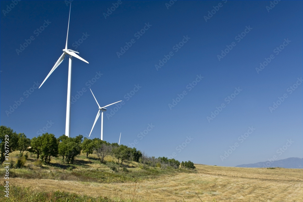 Electric power wind generators stationed on a hill Electric power wind generators stationed on a hill