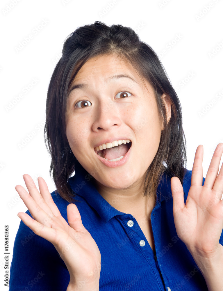Asian girl is happy and a little surprised Asian girl is happy and a little surprised