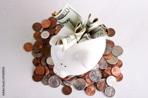 Stuffed full piggy bank from above