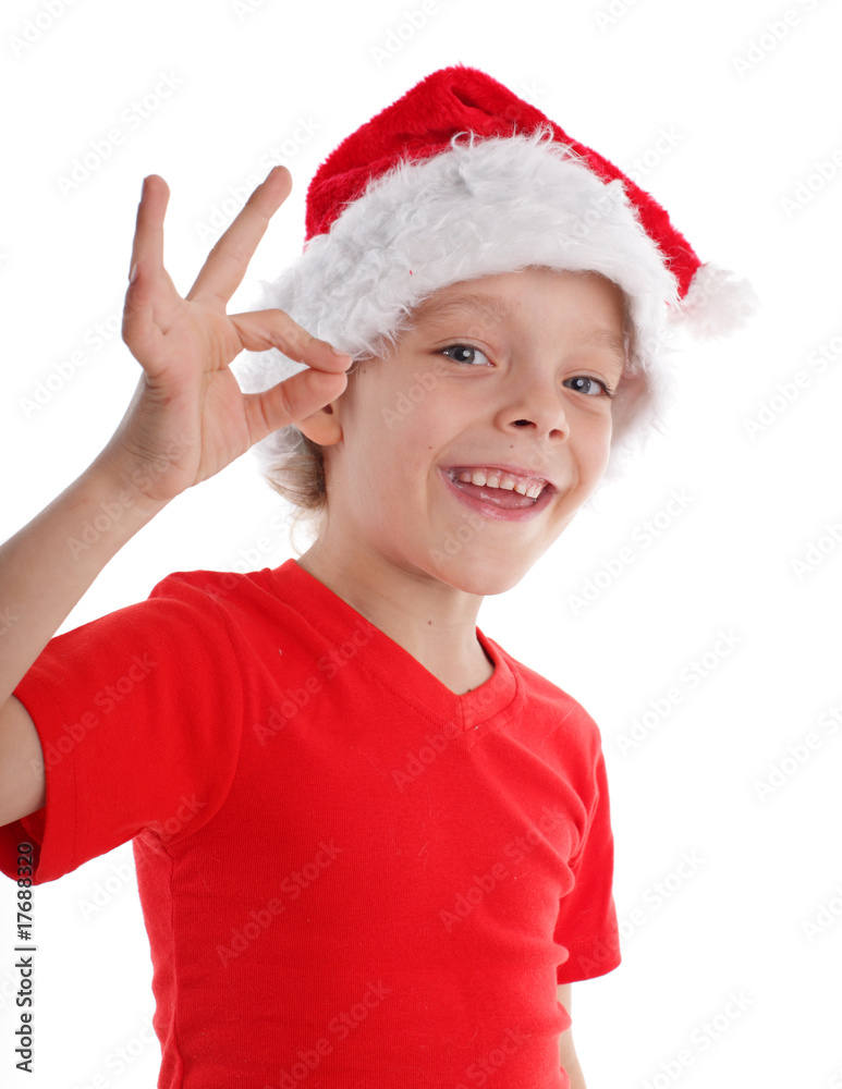 Happy child in christmas hat Happy child in christmas hat