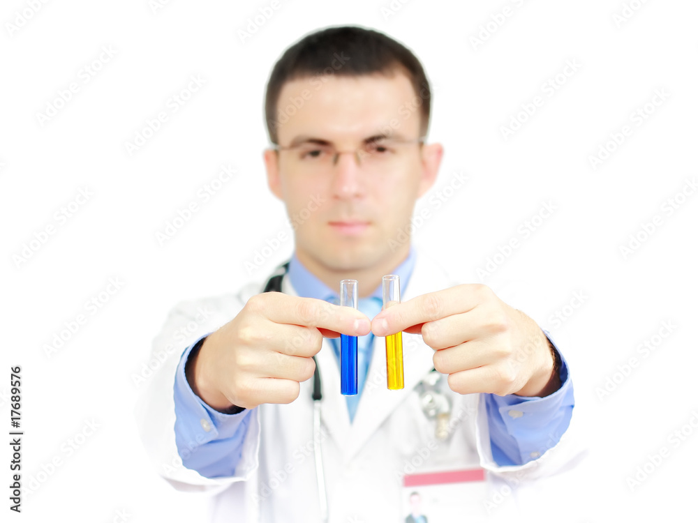Young doctor -intern compare a medical test glass . Isolated. Young doctor -intern compare a medical test glass . Isolated.