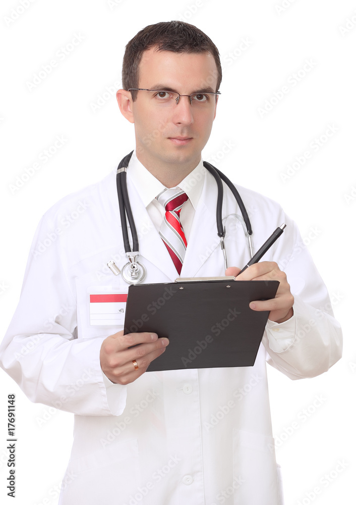 Young medical doctor write on paper pad. Isolated Young medical doctor write on paper pad. Isolated