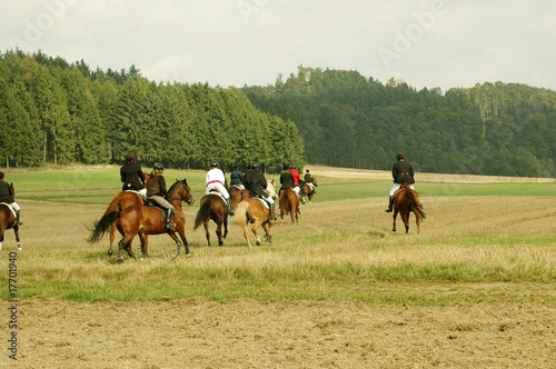 Horses and riders.