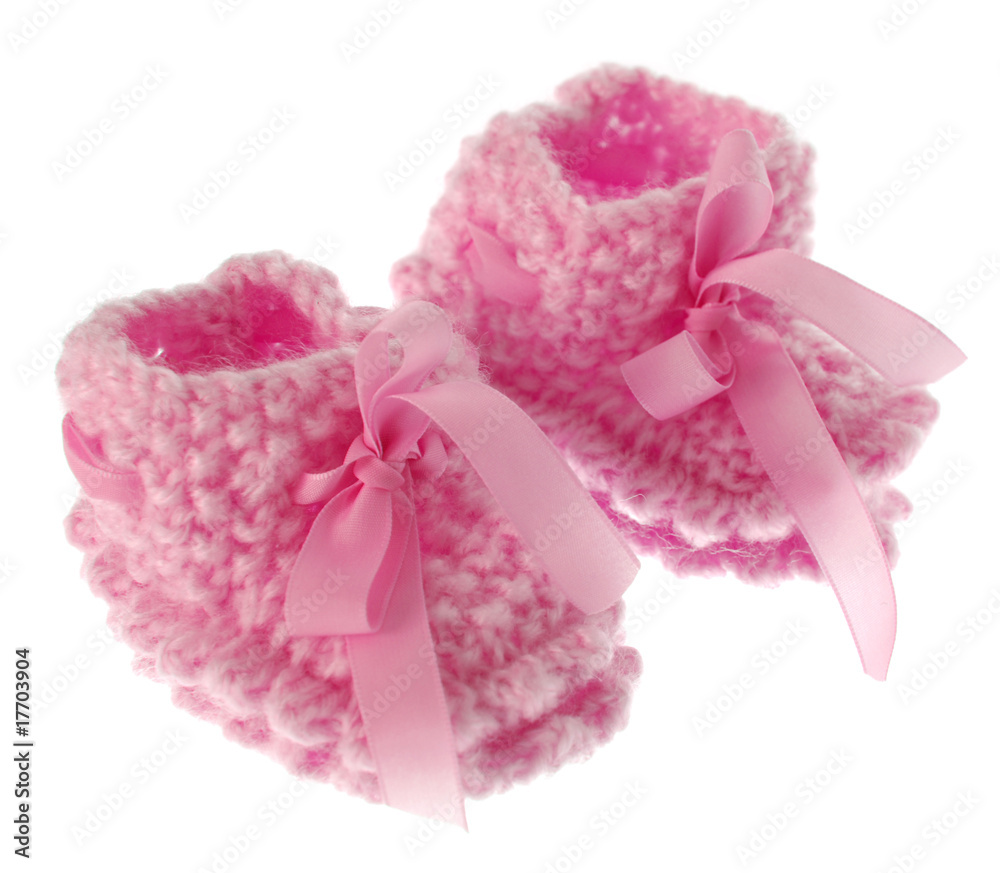 Cute wollen baby shoes on white background Cute wollen baby shoes on white background