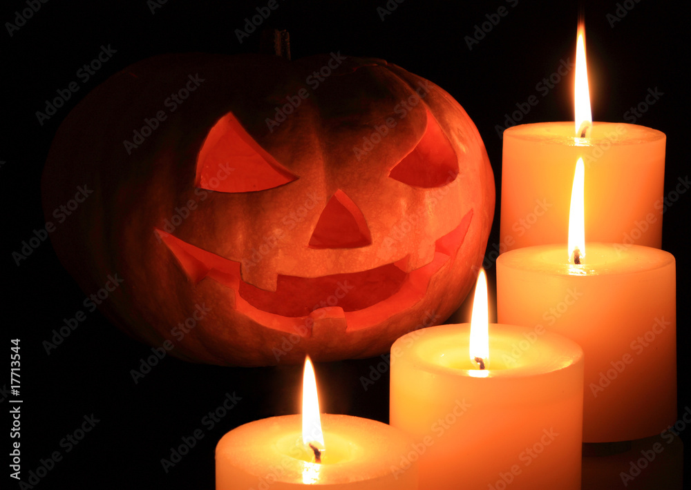 Jack O' Lantern surrounded by candles Jack O' Lantern surrounded by candles