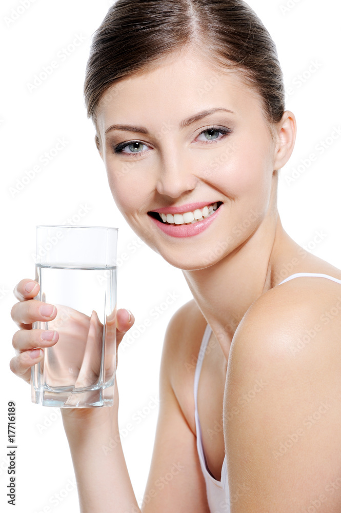 Attractive woman with a clean glass of water Attractive woman with a clean glass of water