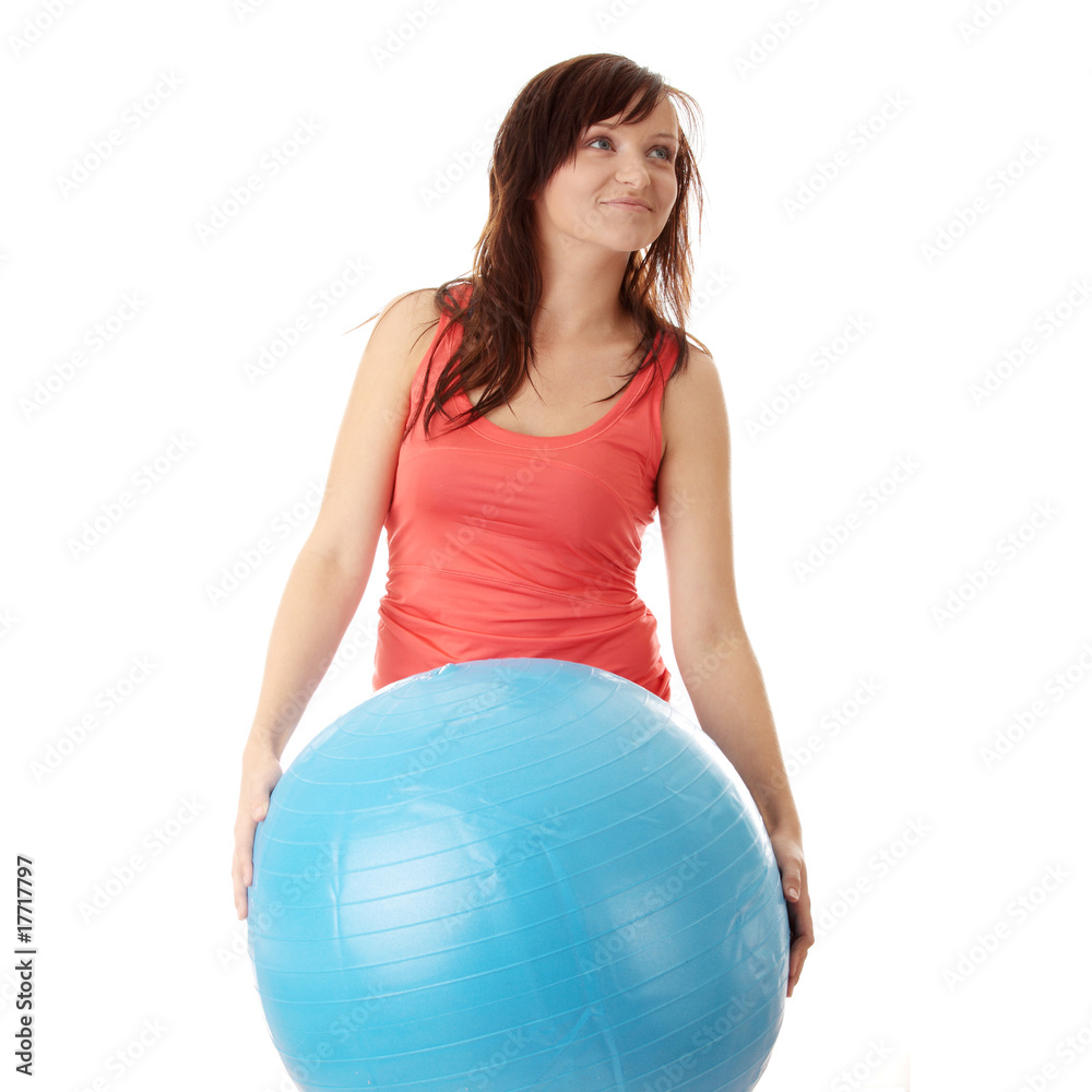 Young happy woman doing fitness exercise Young happy woman doing fitness exercise