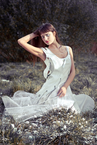 girl in white dress on the grass