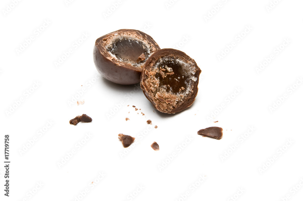 Chocolate ball cut in half with crumbs Chocolate ball cut in half with crumbs