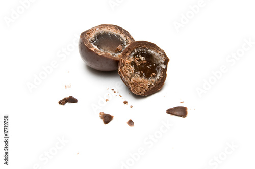 Chocolate ball cut in half with crumbs