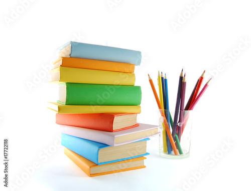 A stack of color books and pencils