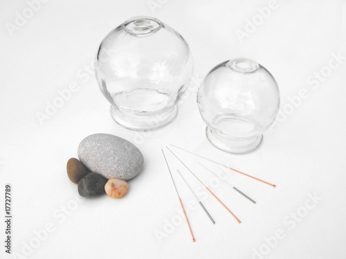 Fototapeta Naklejka Na Ścianę i Meble -  Acupuncture needles with glass cups