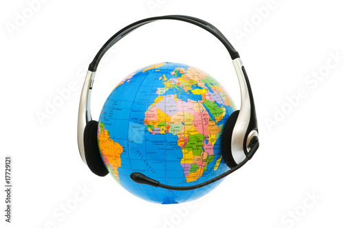 Headset on globe isolated on the white