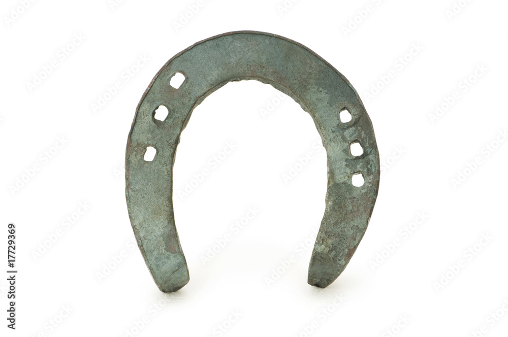 Metal horse shoe isolated on the white Metal horse shoe isolated on the white