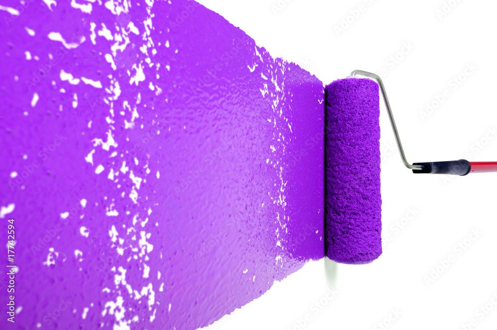 Obraz premium Roller With Purple Paint on White Wall