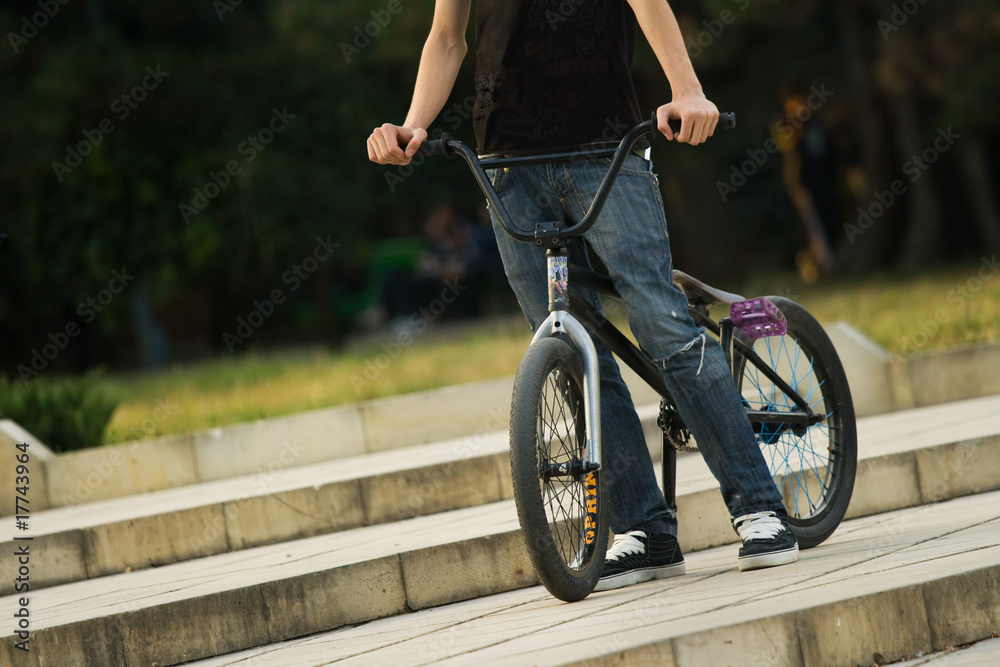 Fototapeta premium young biker riding a bmx bicycle