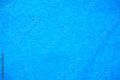 Photo of water surface in a pool.