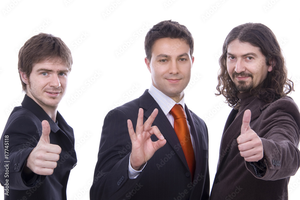 three happy business men together as a team tumbs up three happy business men together as a team tumbs up