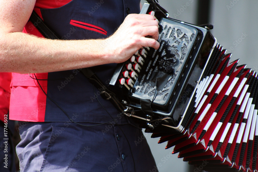 espectaculo musical . acordeon cromatico instrumento de viento Stock Photo  | Adobe Stock