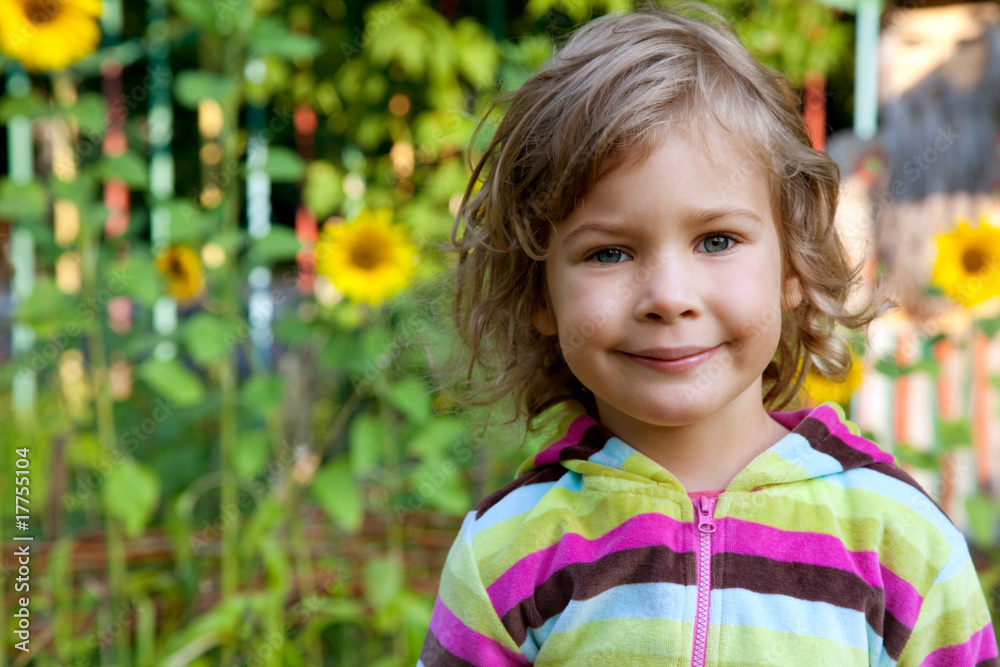 closeup portrait of young girl outdoors with sunflowers closeup portrait of young girl outdoors with sunflowers
