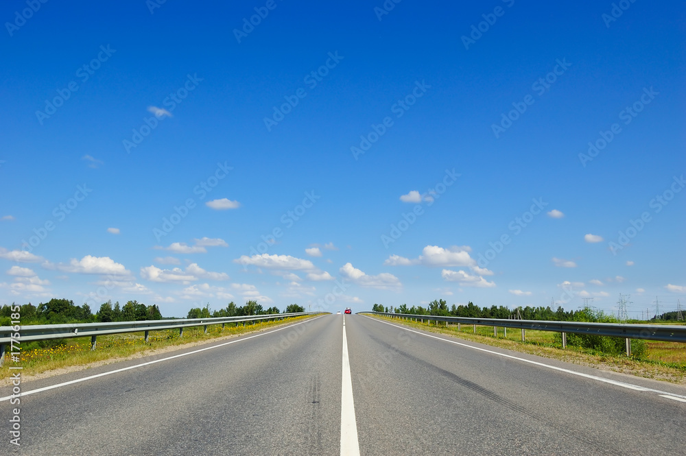Road with cars going in the opposite direction Road with cars going in the opposite direction