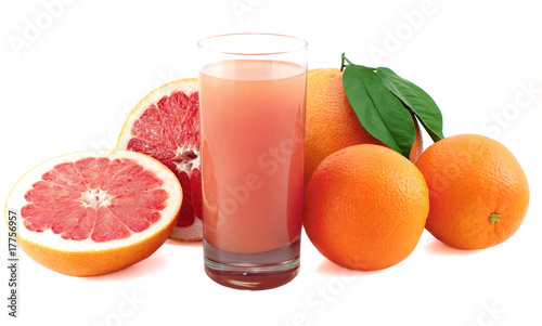 Juicy grapefruit oranges and  juice glass