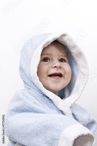 smiling baby wrapped