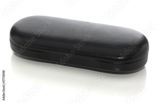 Closed black glasses case on white with clipping path