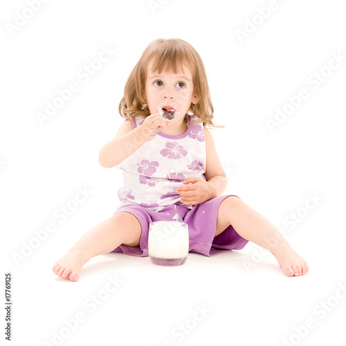 little girl with yogurt
