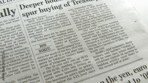 Economy newspaper business and finance concept, mini dolly shot