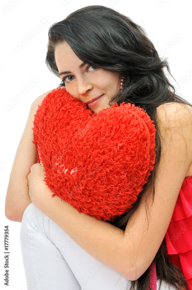 Sexy young girl with toy-heart