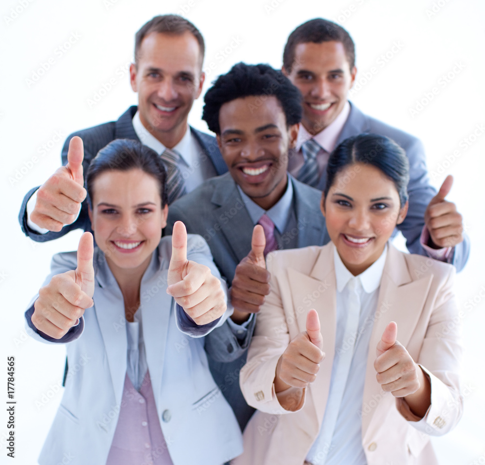 High angle of multi-ethnic business team with thumbs up High angle of multi-ethnic business team with thumbs up