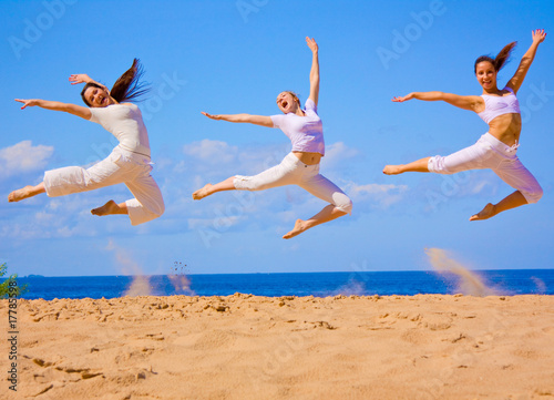 Active girls on a beach