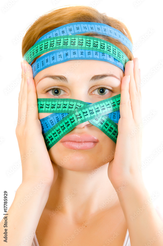 woman with a measuring tape woman with a measuring tape