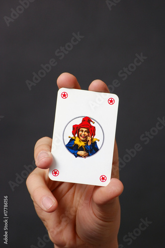 Fotografie Joker card in hand