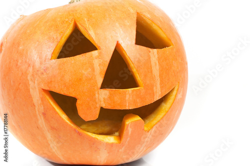 Creepy carved pumpkin face, with a smile