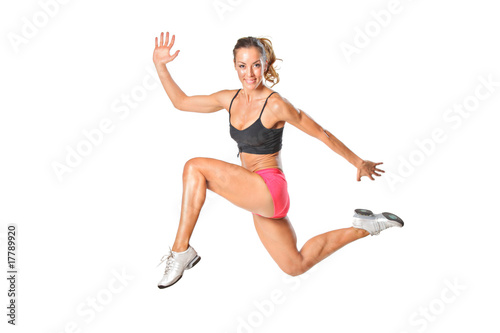 An attractive woman in a jump isolated on white