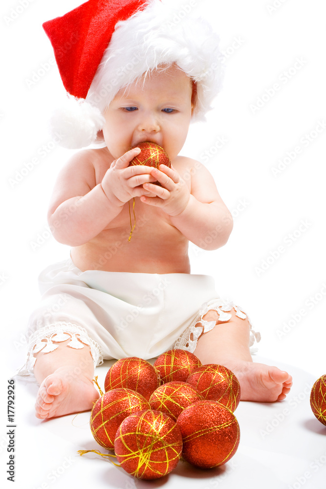 Baby with Christmas balls