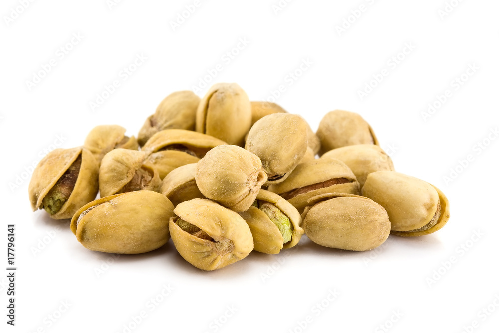 Heap of Pistachios isolated on a white background Heap of Pistachios isolated on a white background