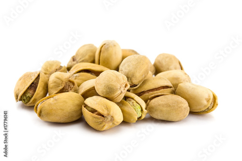 Heap of Pistachios isolated on a white background