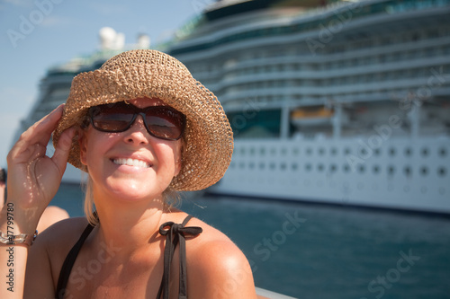 Beautiful Vacationing Woman with Cruise Ship