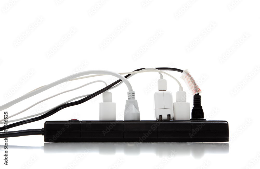 Overloaded surge protector on a white background Overloaded surge protector on a white background