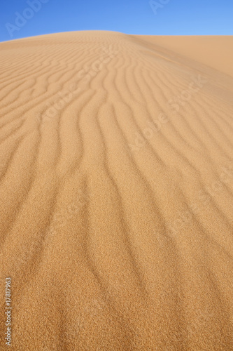 desert sand dune with blue sky