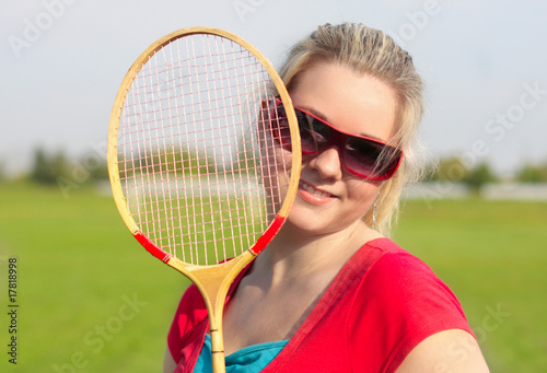 woman with badminton racquet