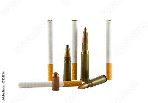 Choice a bullet or a cigarette isolated on white