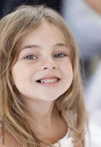 Little girl smiling at the camera