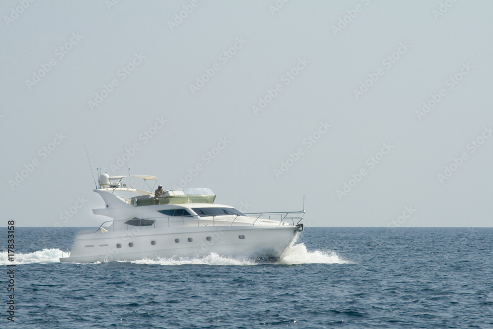 Luxury white yacht in the blue ocean