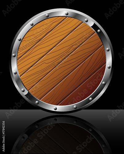 Round shield from wood and steel - isolated on black