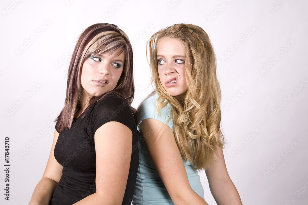 Expression two girls snarling Expression two girls snarling