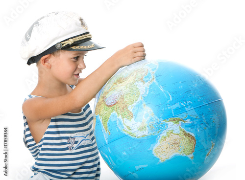 Boy holding a globe